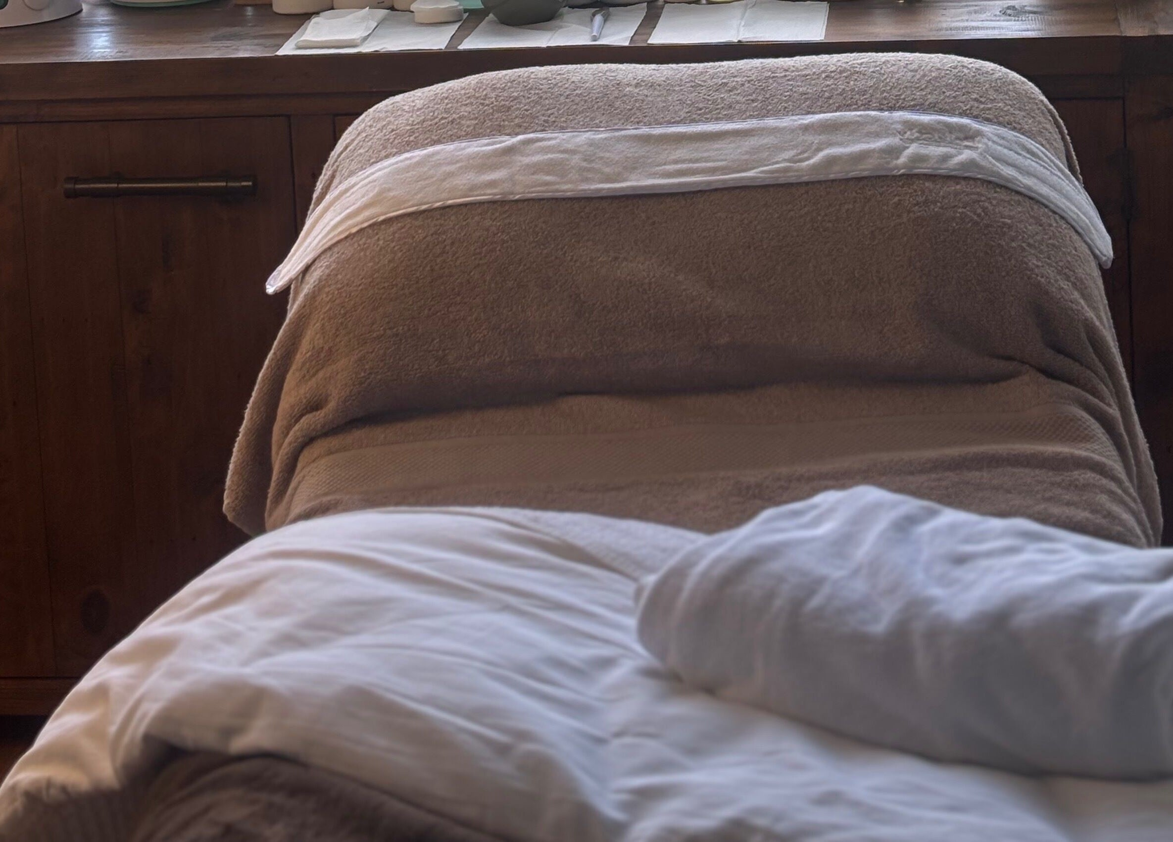 Cozy massage table at Brows by Britt in Wollongong, New South Wales, AU offers a serene spa experience.