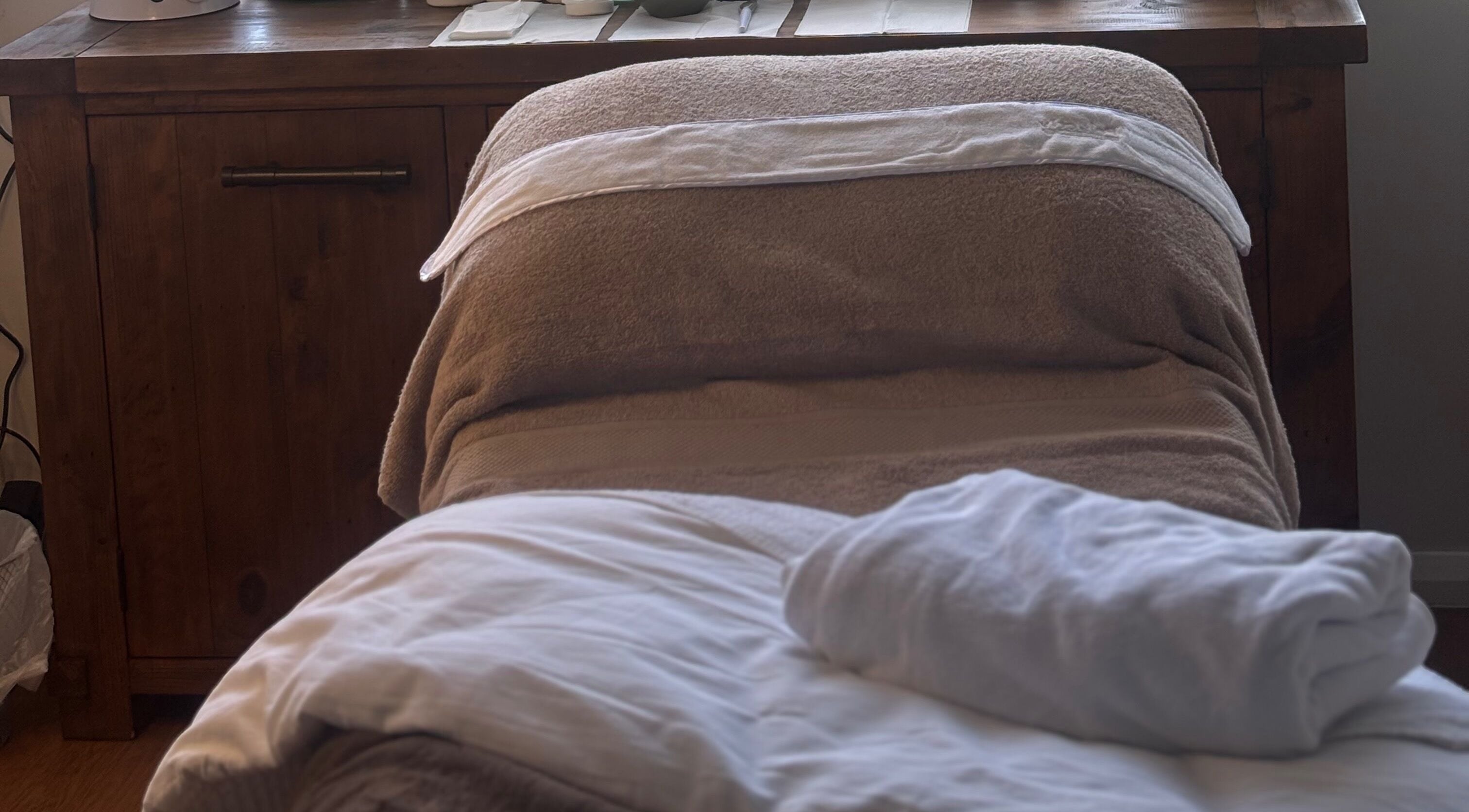 Cozy massage table at Brows by Britt in Wollongong, New South Wales, AU offers a serene spa experience.