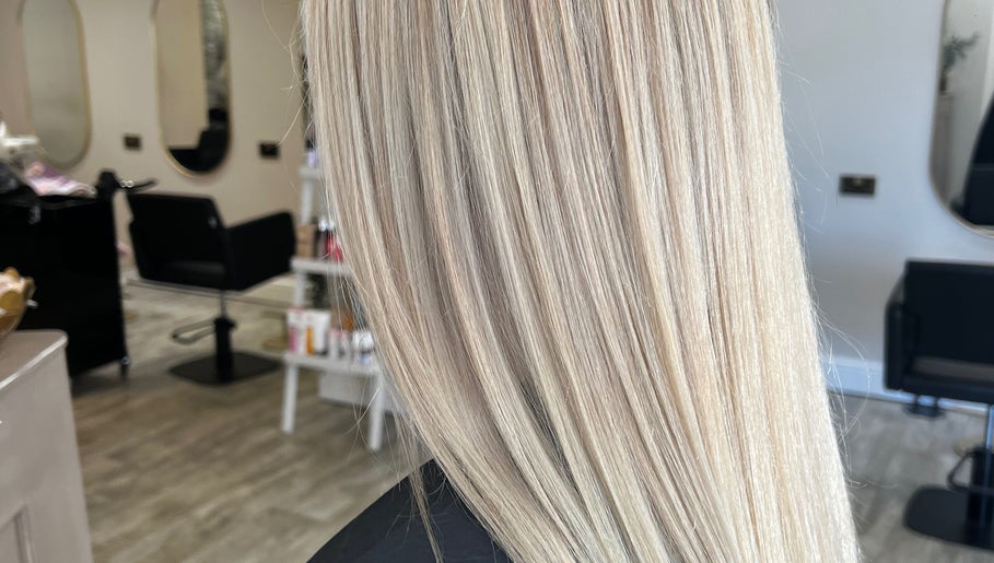 Blonde hair styled at Hair by BethanyG salon in Fareham, England, GB, showcasing sleek, shiny finish.