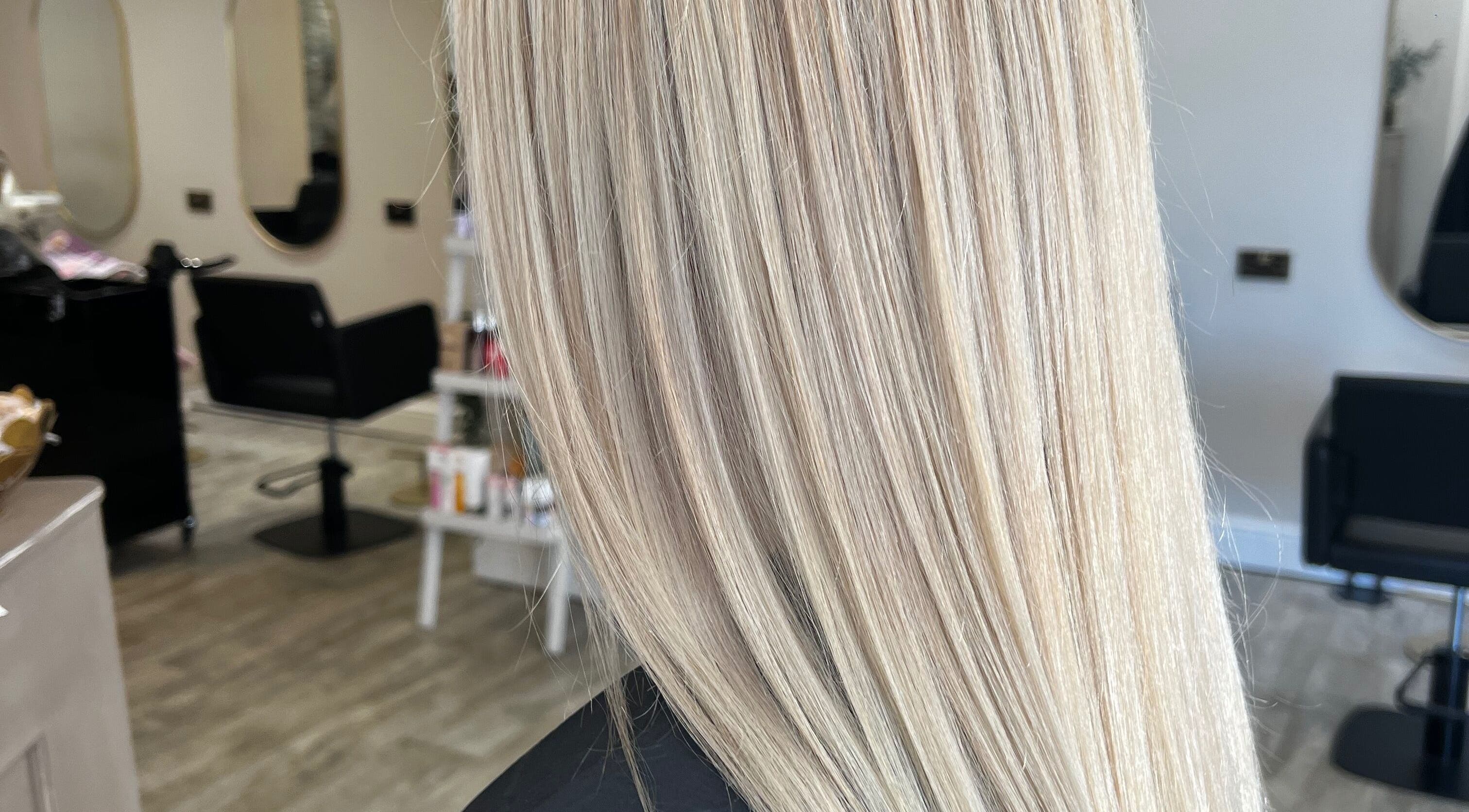 Blonde hair styled at Hair by BethanyG salon in Fareham, England, GB, showcasing sleek, shiny finish.
