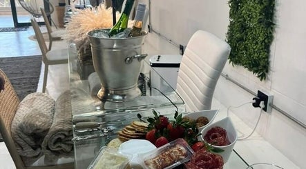 Chic interior with snacks and drinks at SôR Salon, Pretoria, Gauteng, ZA.