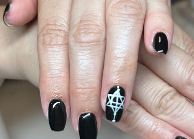 Elegant black nail art at Bridie’s Beauty, Kessingland, England, GB showcasing design excellence.