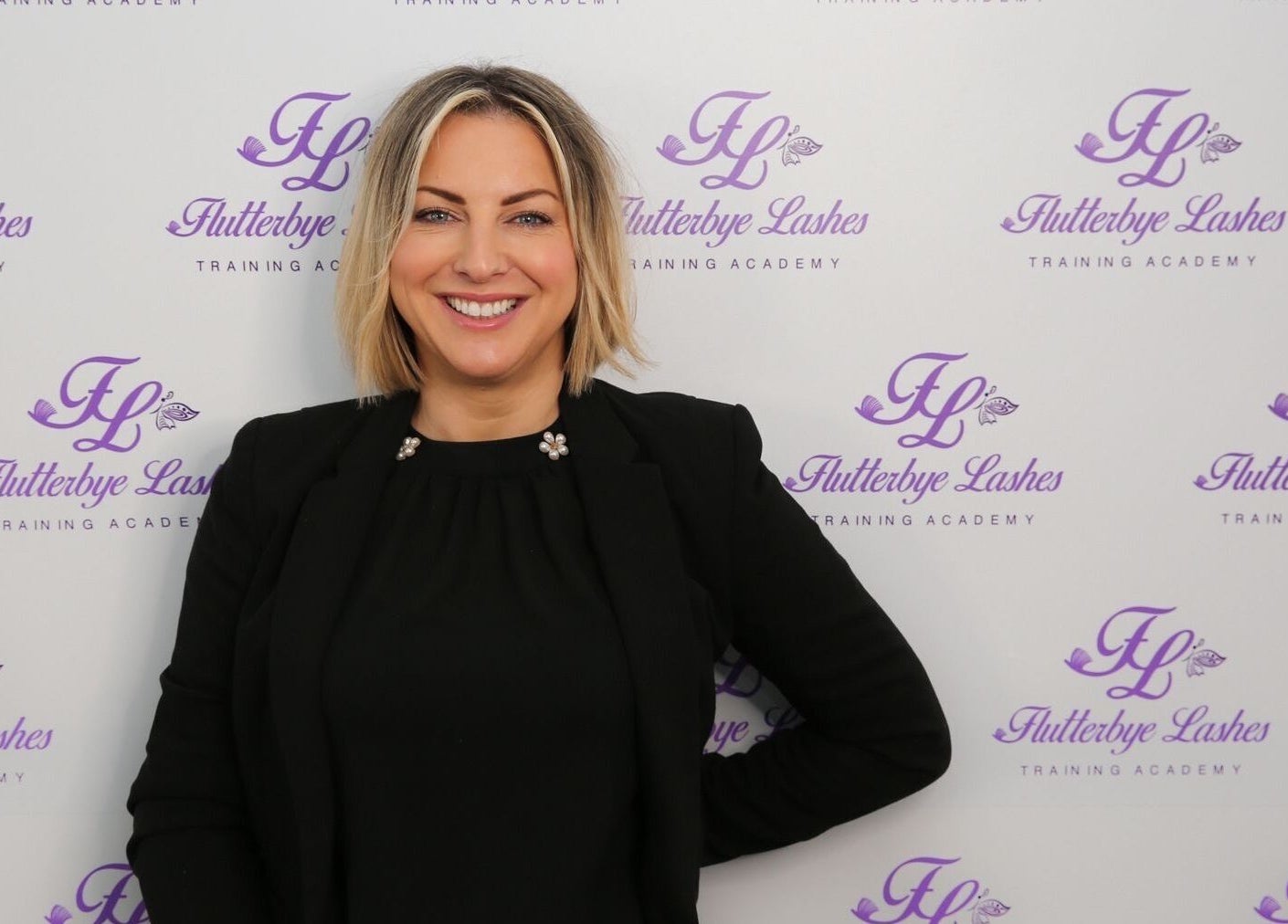 Bridie’s Beauty at Flutterbye Lashes, Lowestoft, England, showcases elegant branding backdrop.