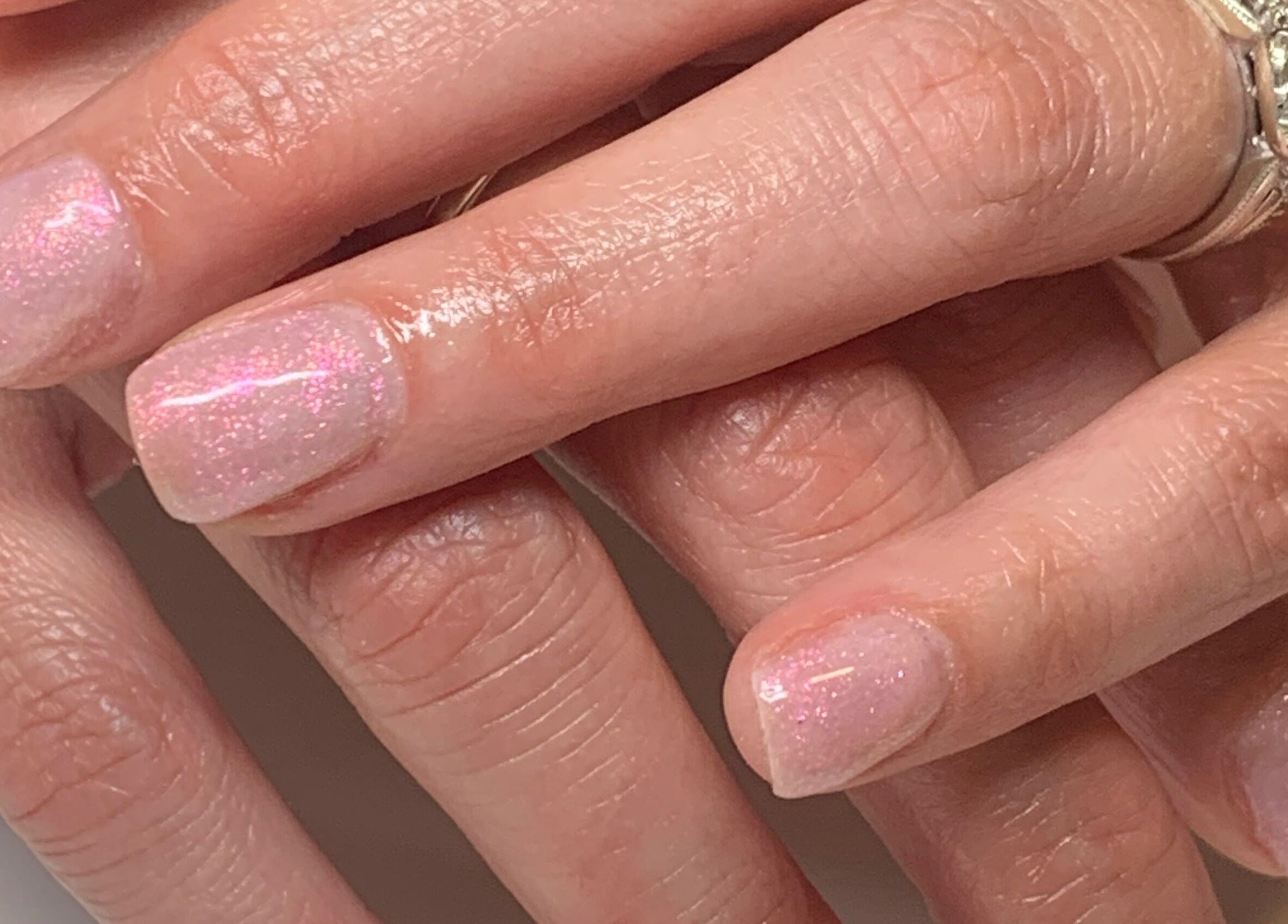 Elegant pink glitter manicure from Bridie’s Beauty at Flutterbye Lashes, Lowestoft, England, GB.