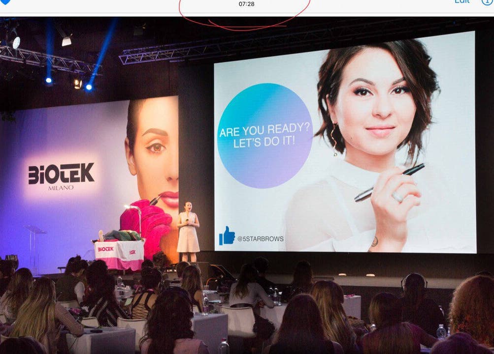 Audience at 5 Star Academy event in Dallas, Texas, US, enjoying beauty presentation.