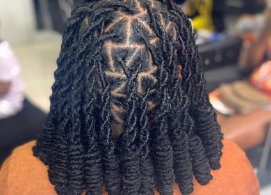 Beautifully styled locs at Locs by Shawna, Montego Bay, St. James Parish, JM. Expertise in natural hair care.