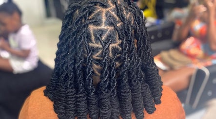 Beautifully styled locs at Locs by Shawna, Montego Bay, St. James Parish, JM. Expertise in natural hair care.