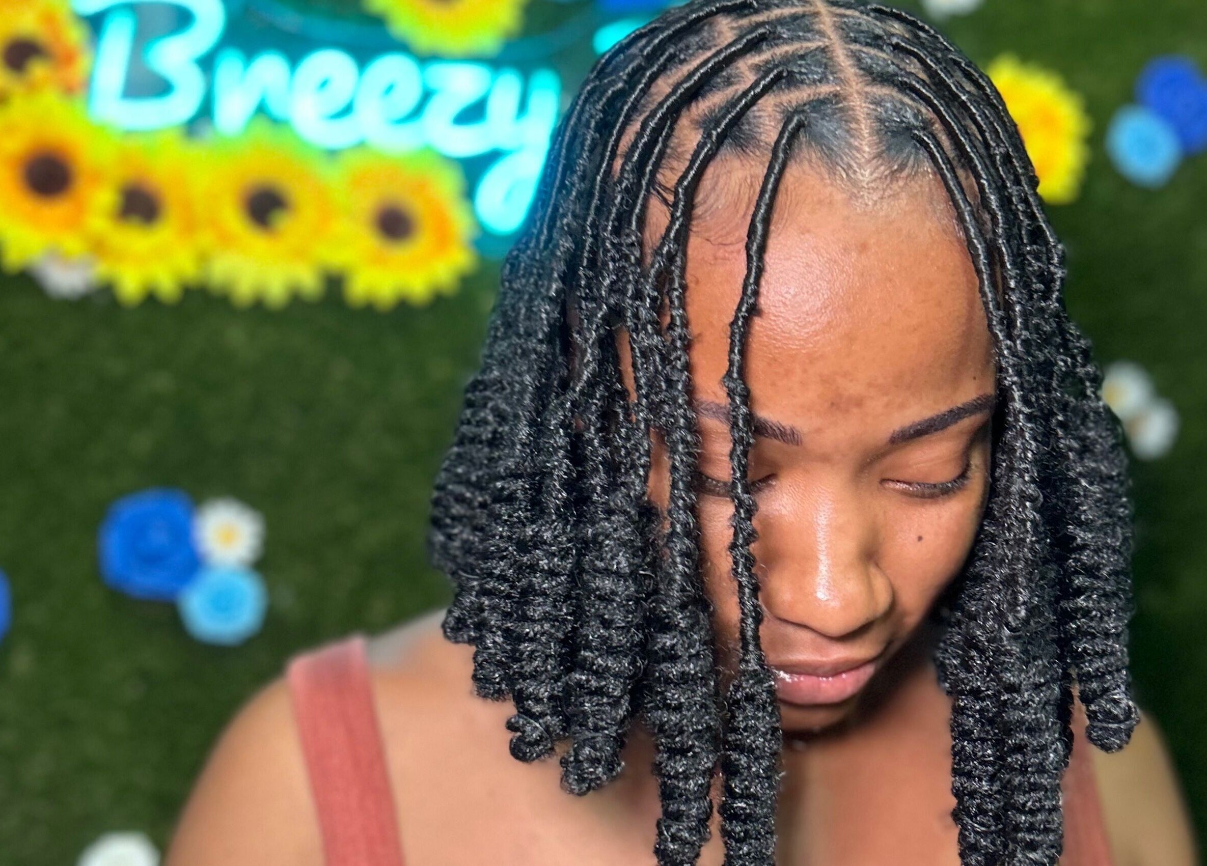 Woman with styled locs at Locs by Shawna, Montego Bay, St. James Parish, JM.