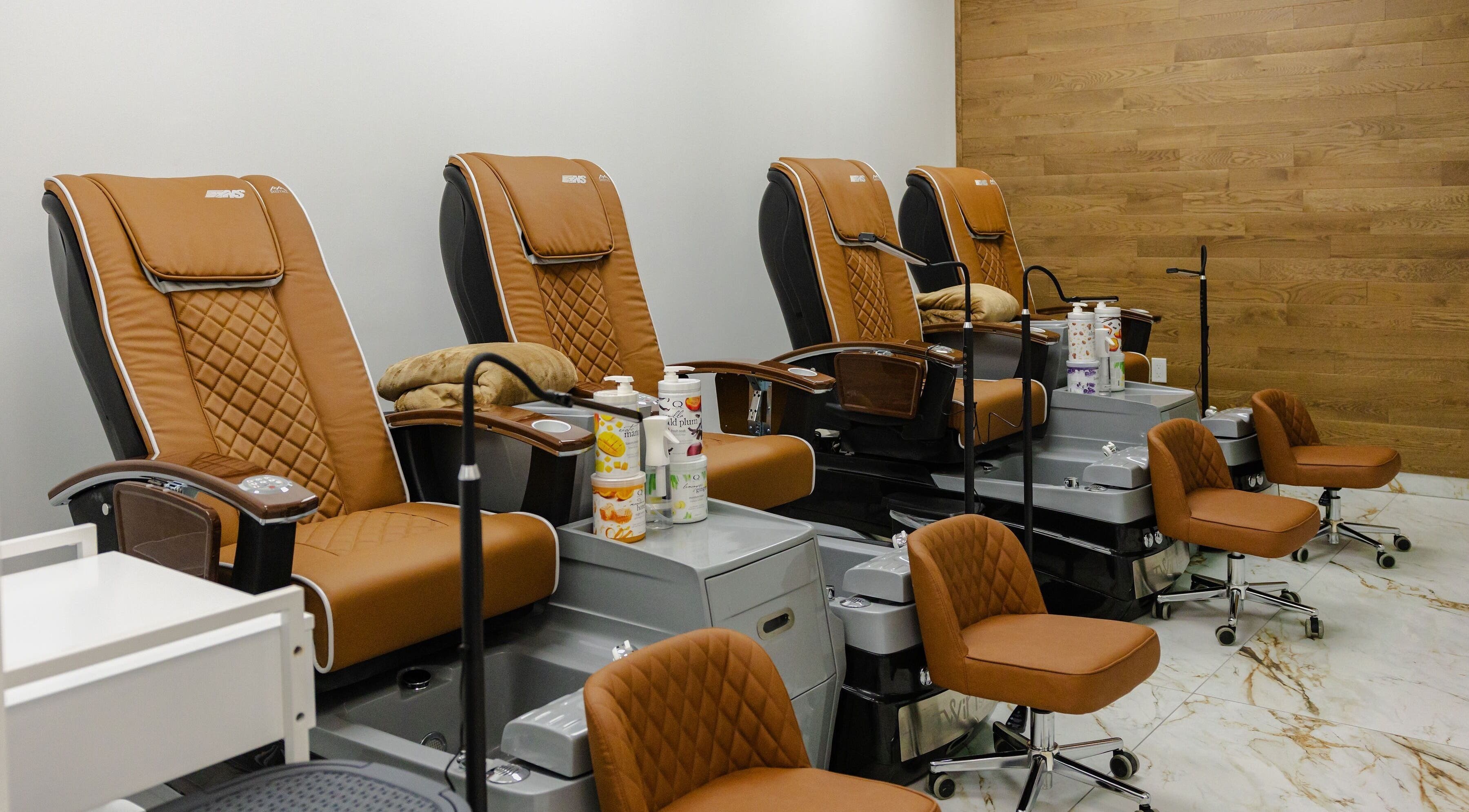 Comfortable pedicure chairs at ODU - Vogue Lashes & Spa in Norfolk, Virginia, US, enhancing relaxation.
