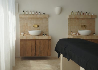 Elegant treatment room at Awild Facial Studio Canggu, Bali, Bali, ID with modern decor and natural light.