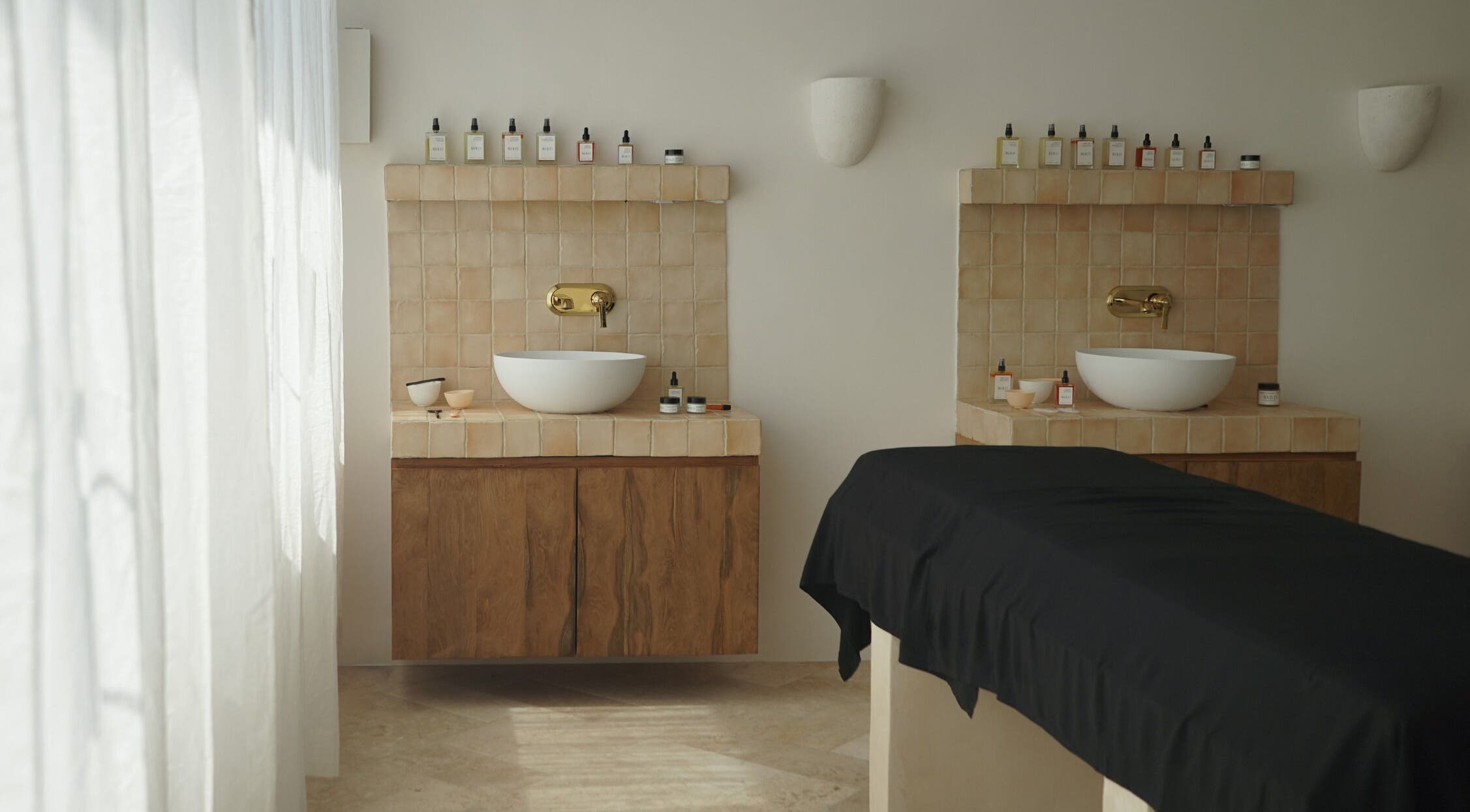 Elegant treatment room at Awild Facial Studio Canggu, Bali, Bali, ID with modern decor and natural light.