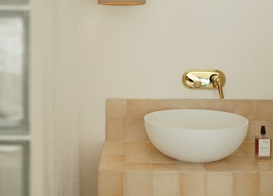 Modern sink with gold faucet at Awild Facial Studio Canggu, Bali, Bali, ID, showcasing minimalist design.