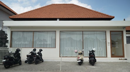 Front view of Awild Facial Studio Canggu in Bali, Bali, ID with scooters parked outside.