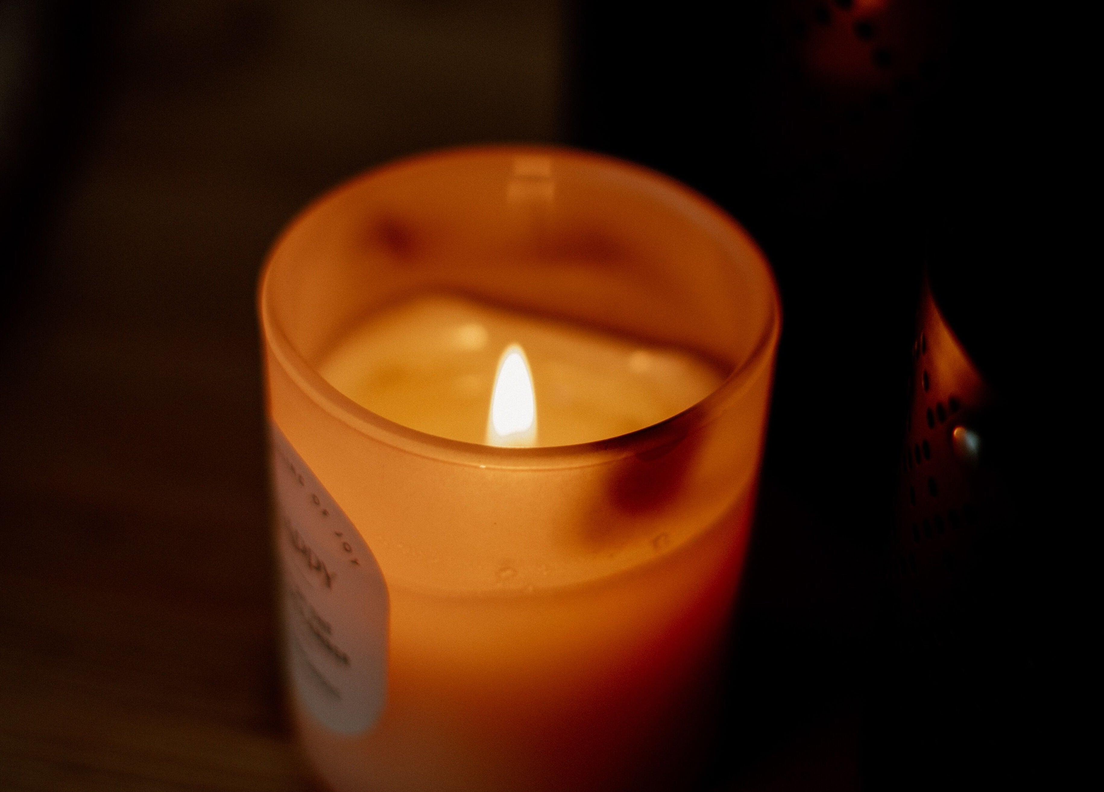 Soothing candle flame adds ambiance at The Sanctuary at Sass, Marsden, England, GB.