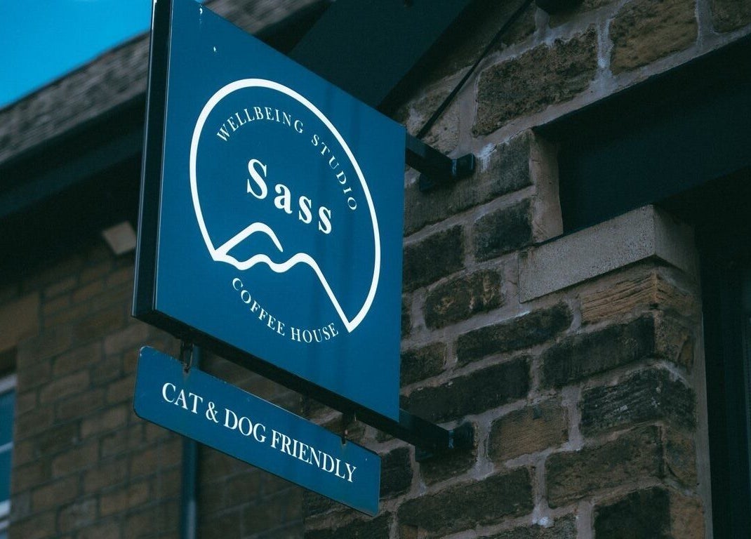 Exterior sign of The Sanctuary at Sass in Marsden, England, GB, showcasing pet-friendly environment.