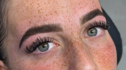 Close-up of flawless eyebrows and long lashes by By Lottie, Wellingborough, England, GB.