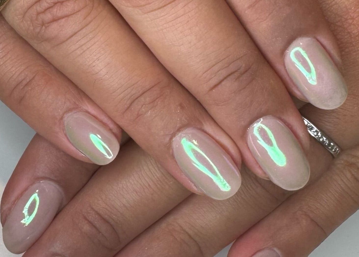 Close-up of glowing nail art at Miso Nail Studio, North Rocks, New South Wales, AU.