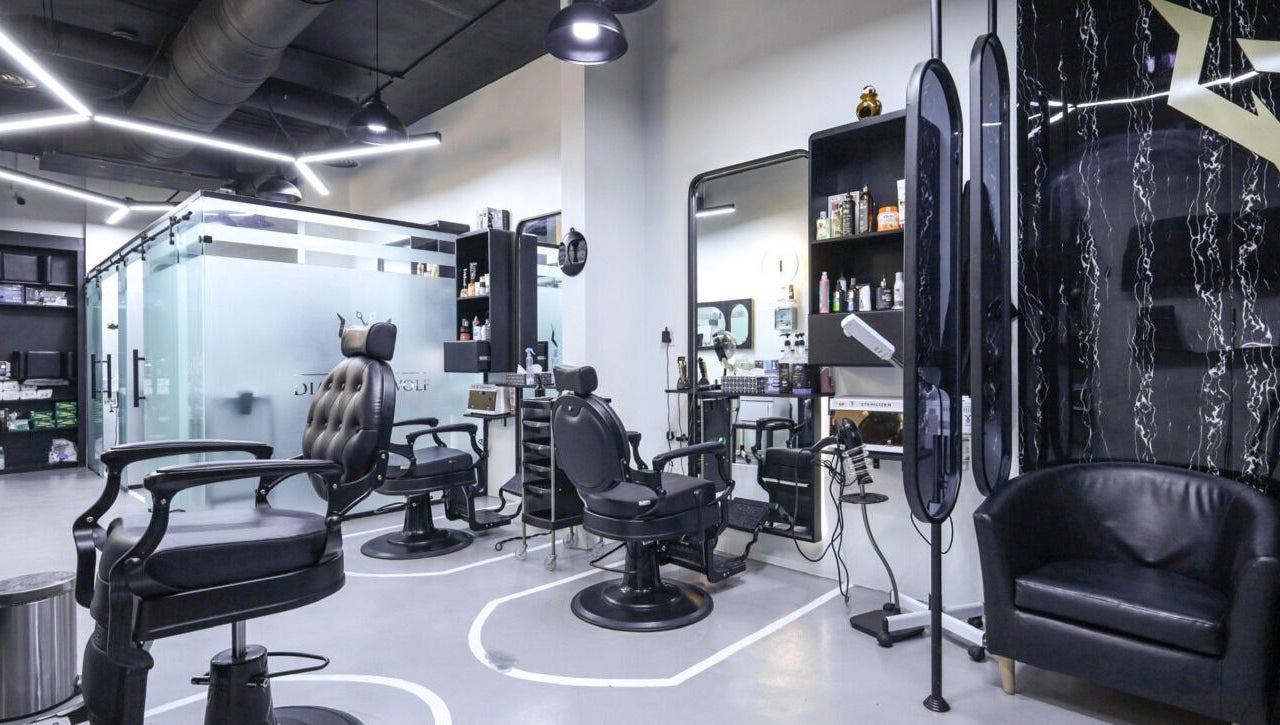 Modern barber chairs in The Diamond Wolf salon, Riyadh, Riyadh Province, SA.