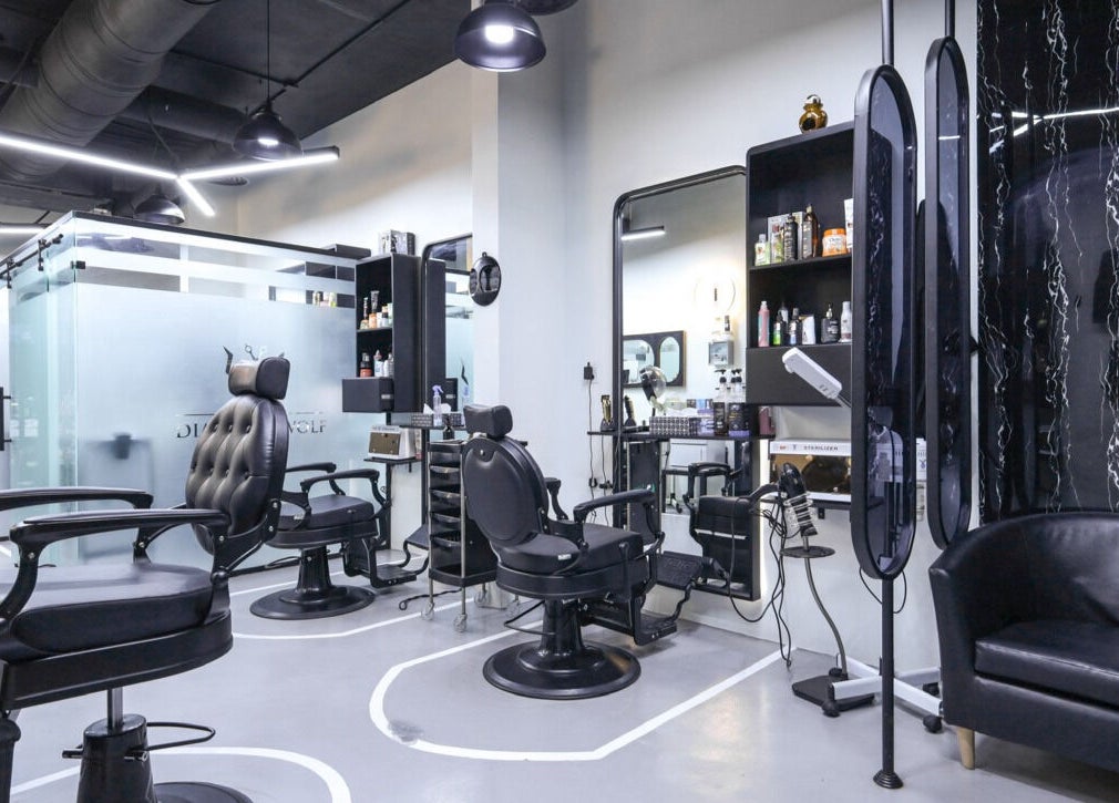 Modern barber chairs in The Diamond Wolf salon, Riyadh, Riyadh Province, SA.