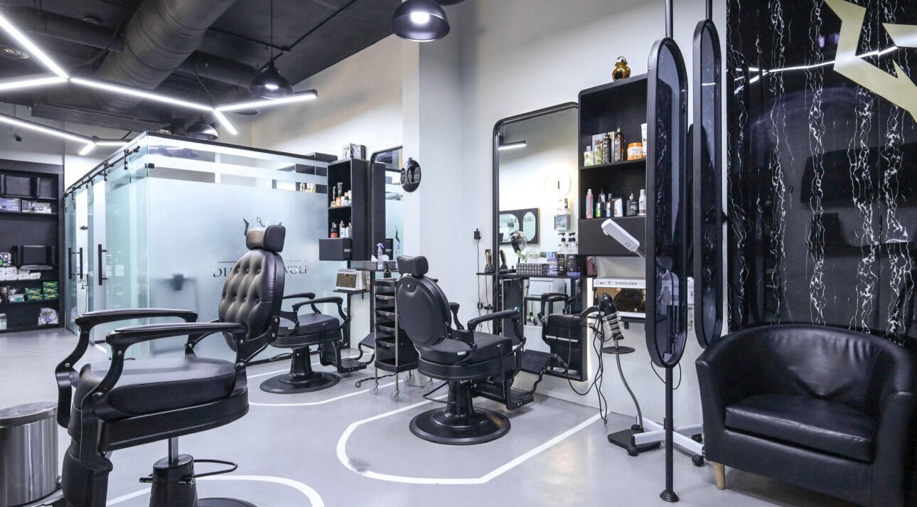 Modern barber chairs in The Diamond Wolf salon, Riyadh, Riyadh Province, SA.