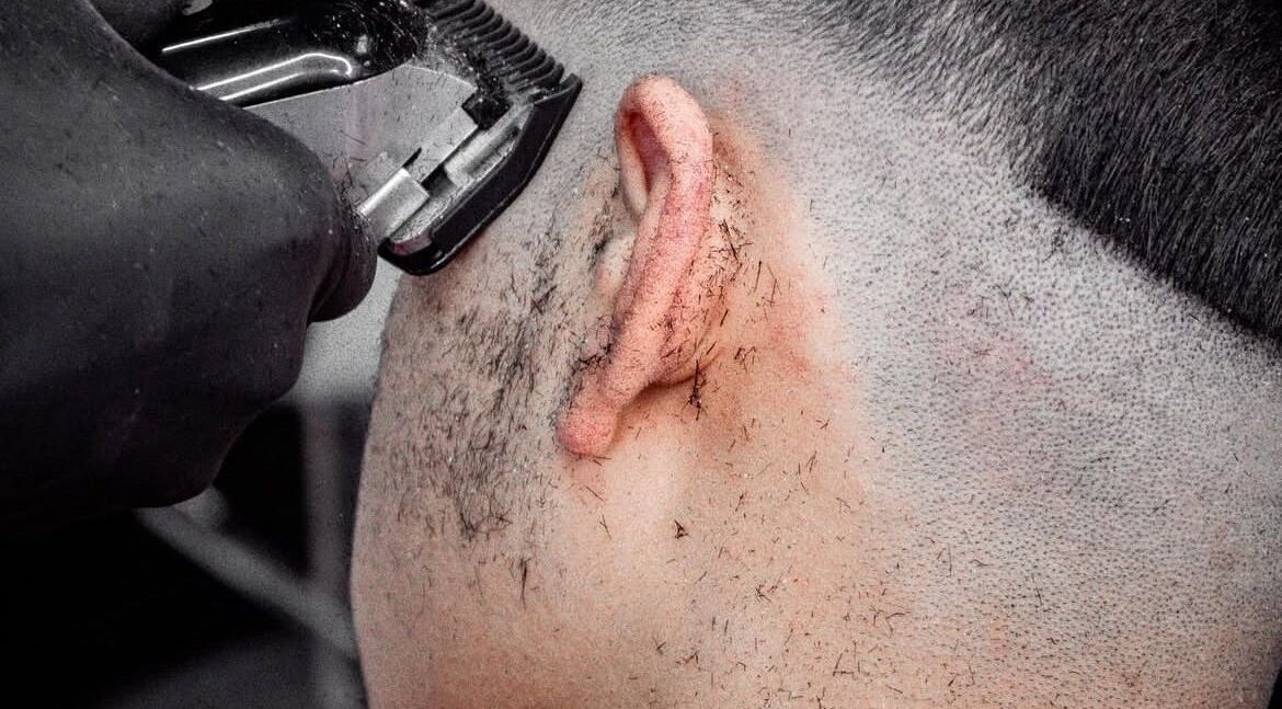 Close-up of a clipper fade haircut at AB Fadez, Nottingham, England, GB.