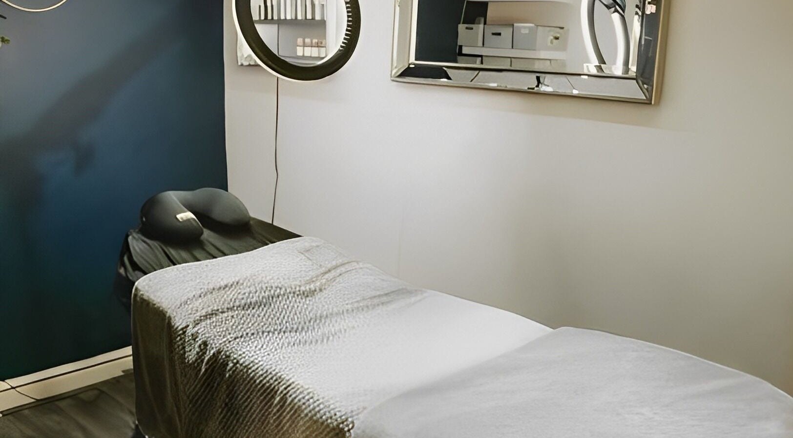 Tranquil treatment room at Bethan Sian, Malton, featuring a massage table and elegant decor. Located in Malton, England, GB.