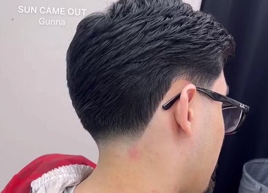 Stylish fade haircut at Daniel Coto Barber Studio, Hamilton, Ontario, CA.