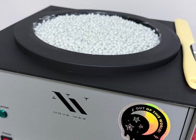 Wax beads and spatula at Sunshine Aesthetics, Roseville, Minnesota, US for premium waxing services.