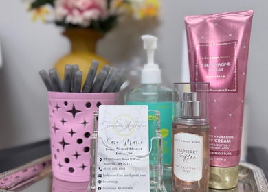Beauty products and business card at Sunshine Aesthetics in Roseville, Minnesota, US.