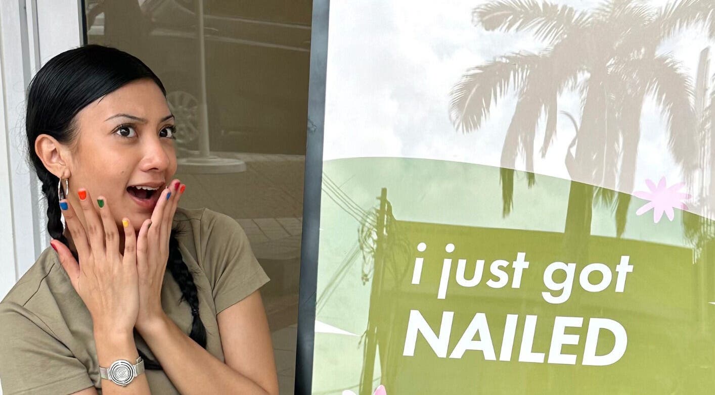 Excited woman with colorful nails at Kaia Experience G Village, Kuala Lumpur, Wilayah Persekutuan Kuala Lumpur, MY.