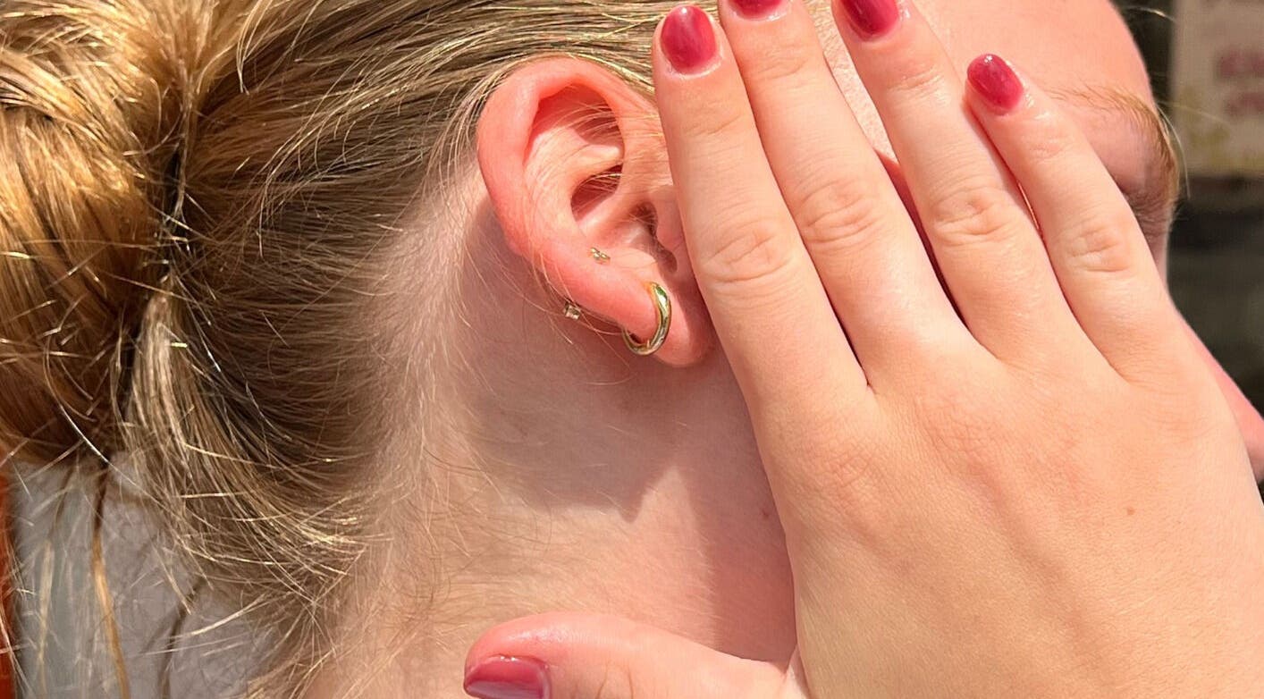 Ear with gold hoop earring at Kaia Experience G Village, Kuala Lumpur, Wilayah Persekutuan Kuala Lumpur, MY.