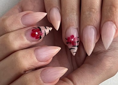 Stunning floral nail art at Cruella De Nails, Langebaan, Western Cape, ZA. Perfect for elegant hands.