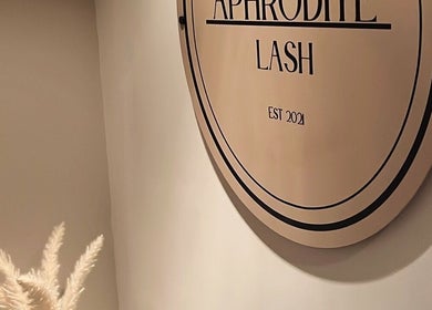 Aphrodite Lash elegant wall sign in Worsbrough, England, GB, showcasing the salon's stylish branding since 2021.