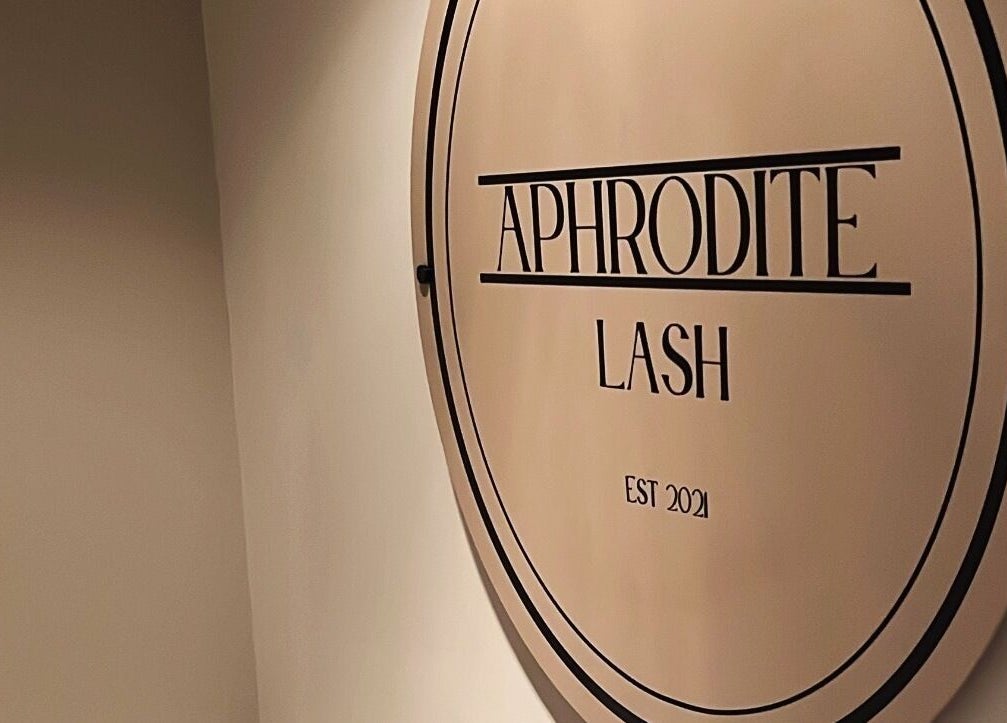 Elegant Aphrodite Lash sign in Worsbrough, England, GB showcasing luxury beauty services.