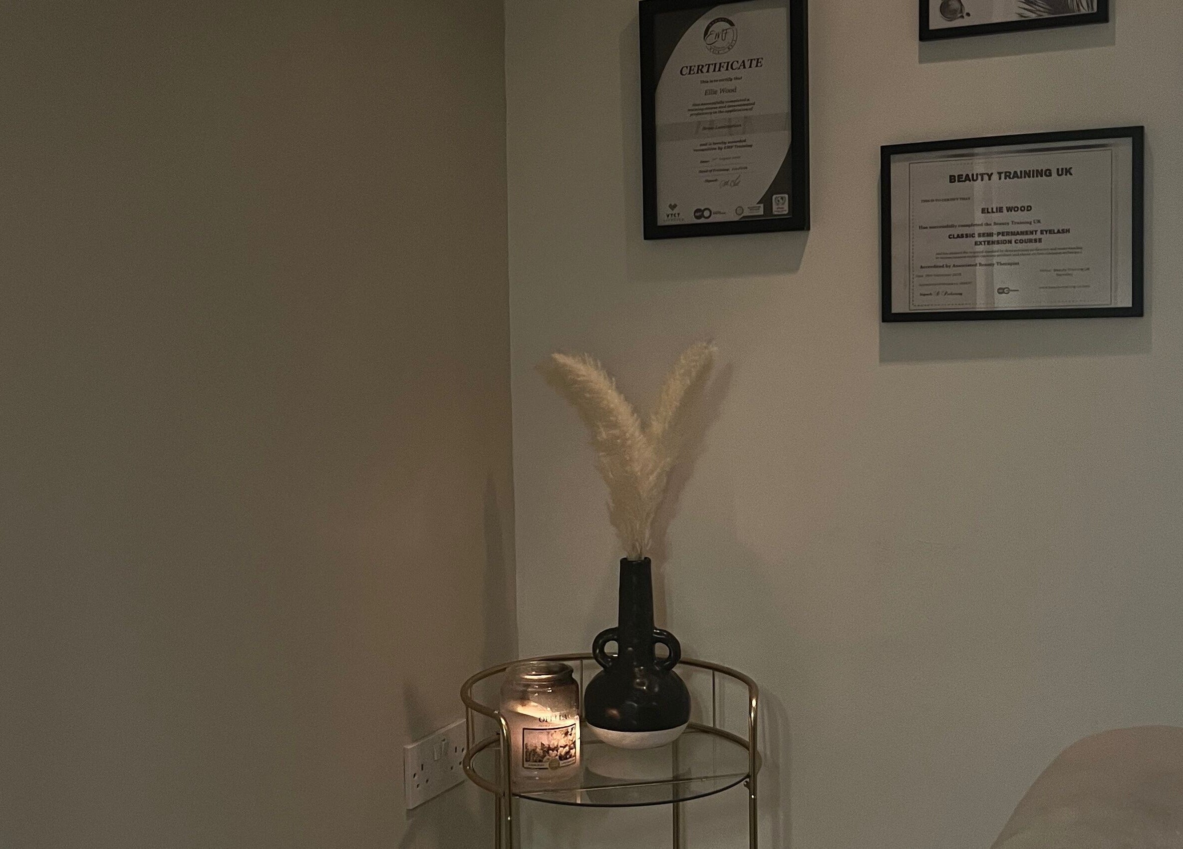 Elegant corner with decor and certificates at Aphrodite Lash, Worsbrough, England, GB.