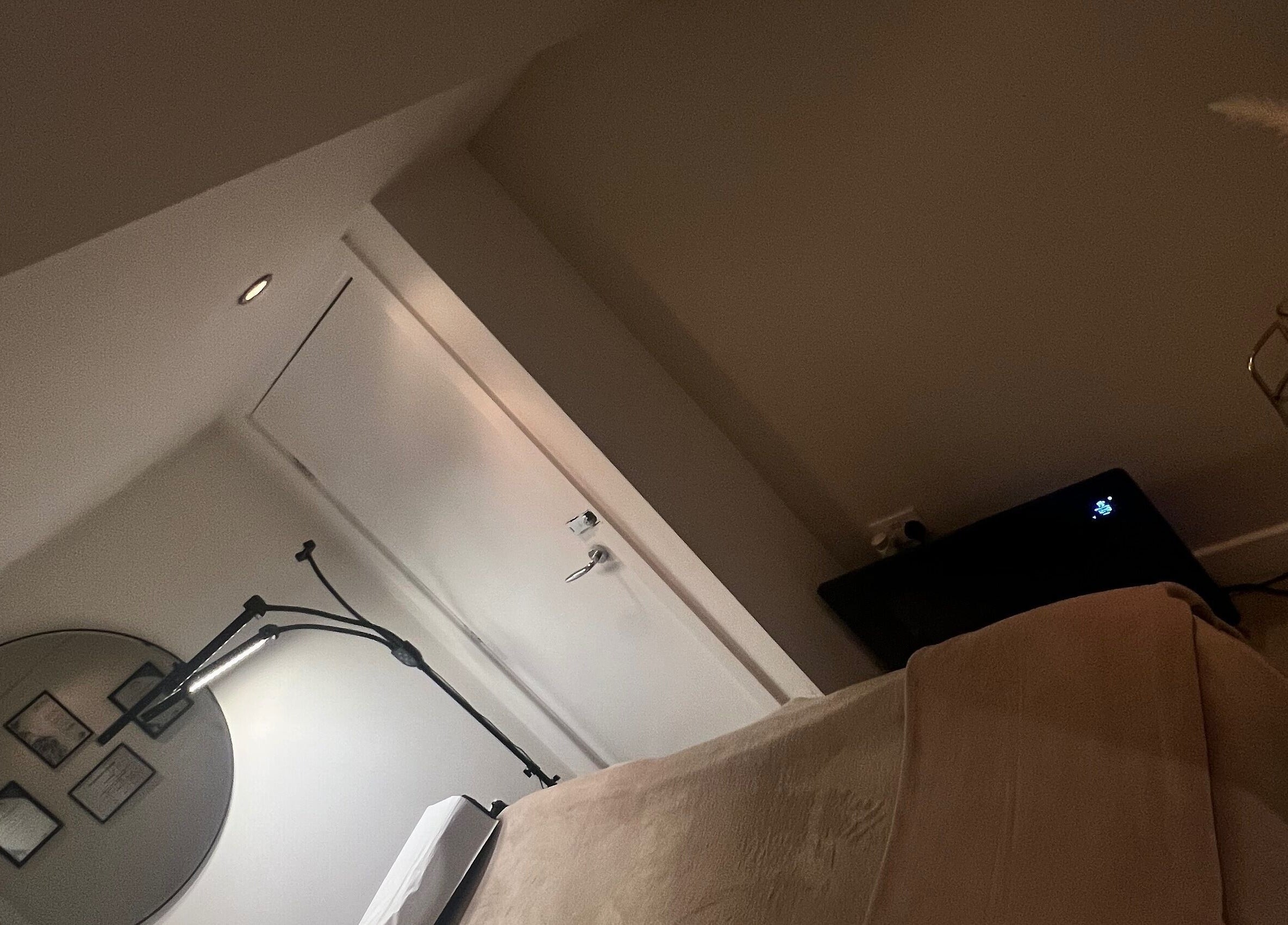 Tranquil beauty room at Aphrodite Lash in Worsbrough, England, GB, featuring elegant decor and plush bedding.