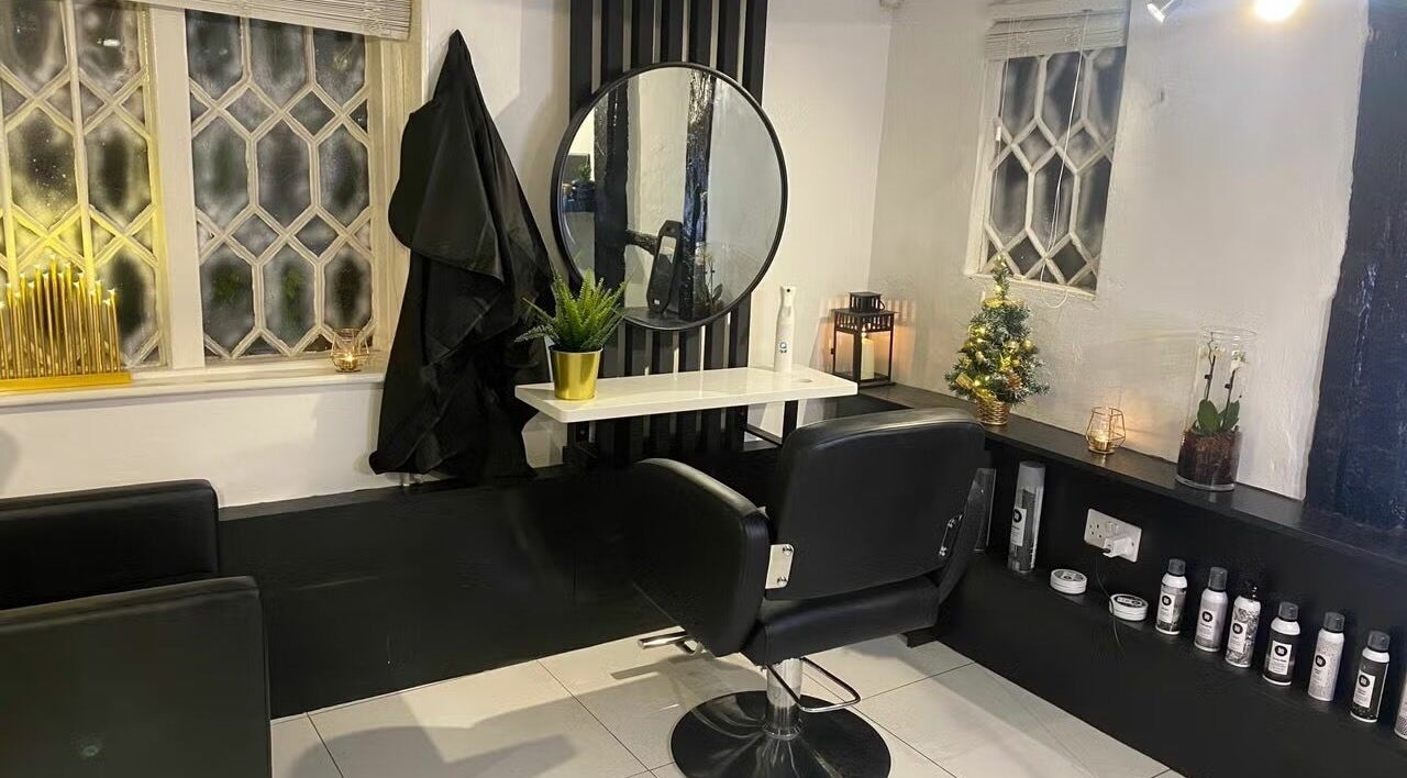 Modern salon chair and mirror setup at Lucia Hanoush Creative, Horsham, England, GB, showcasing elegant decor.