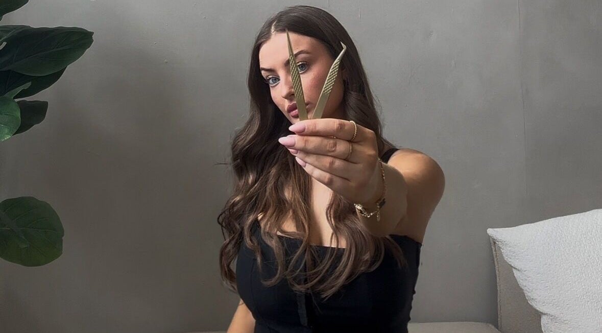 Woman holding eyebrow tools at The Beauty Space in Hinckley, England, GB.