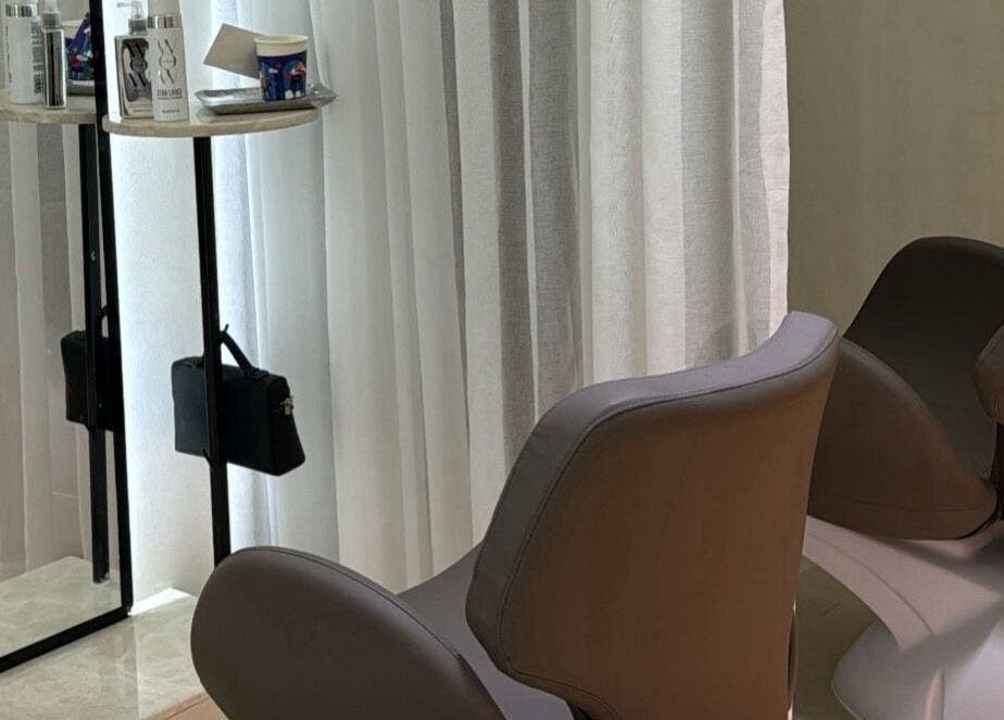 Stylish salon chair at Ray Spa Beauty Center in Al Ain, Abu Dhabi, AE, offering premium beauty services.