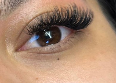 Close-up of eye with lash extensions at Natural Lash Skin Bar, Northville, Michigan, US.
