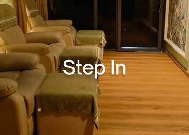 Relax Reflexology's serene lounge in Mumbai, Maharashtra, IN, featuring plush chairs and calming decor.