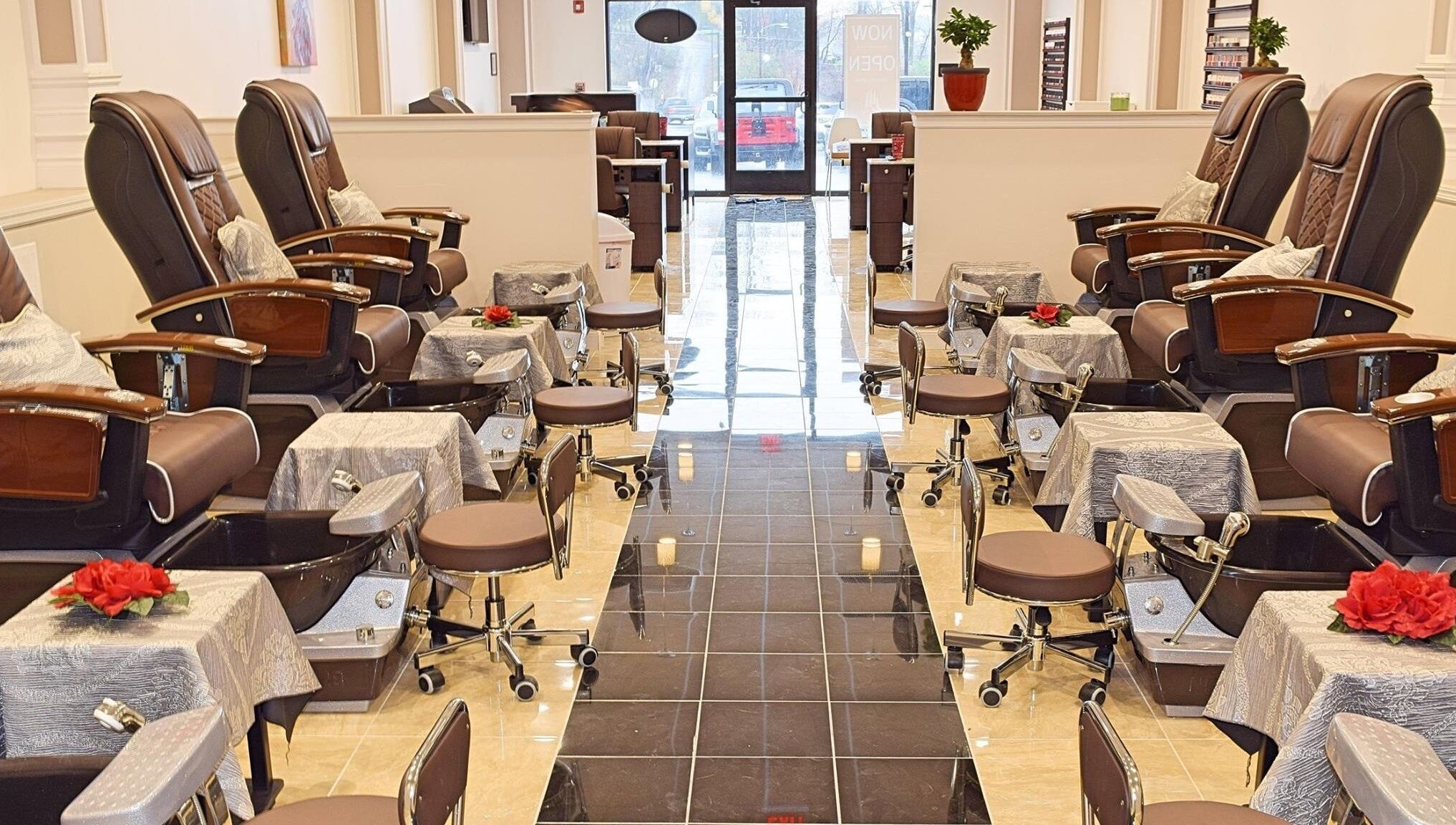 Luxurious pedicure chairs at Mani Nails & Spa in Bethel Park, Pennsylvania, US, offering a serene atmosphere.