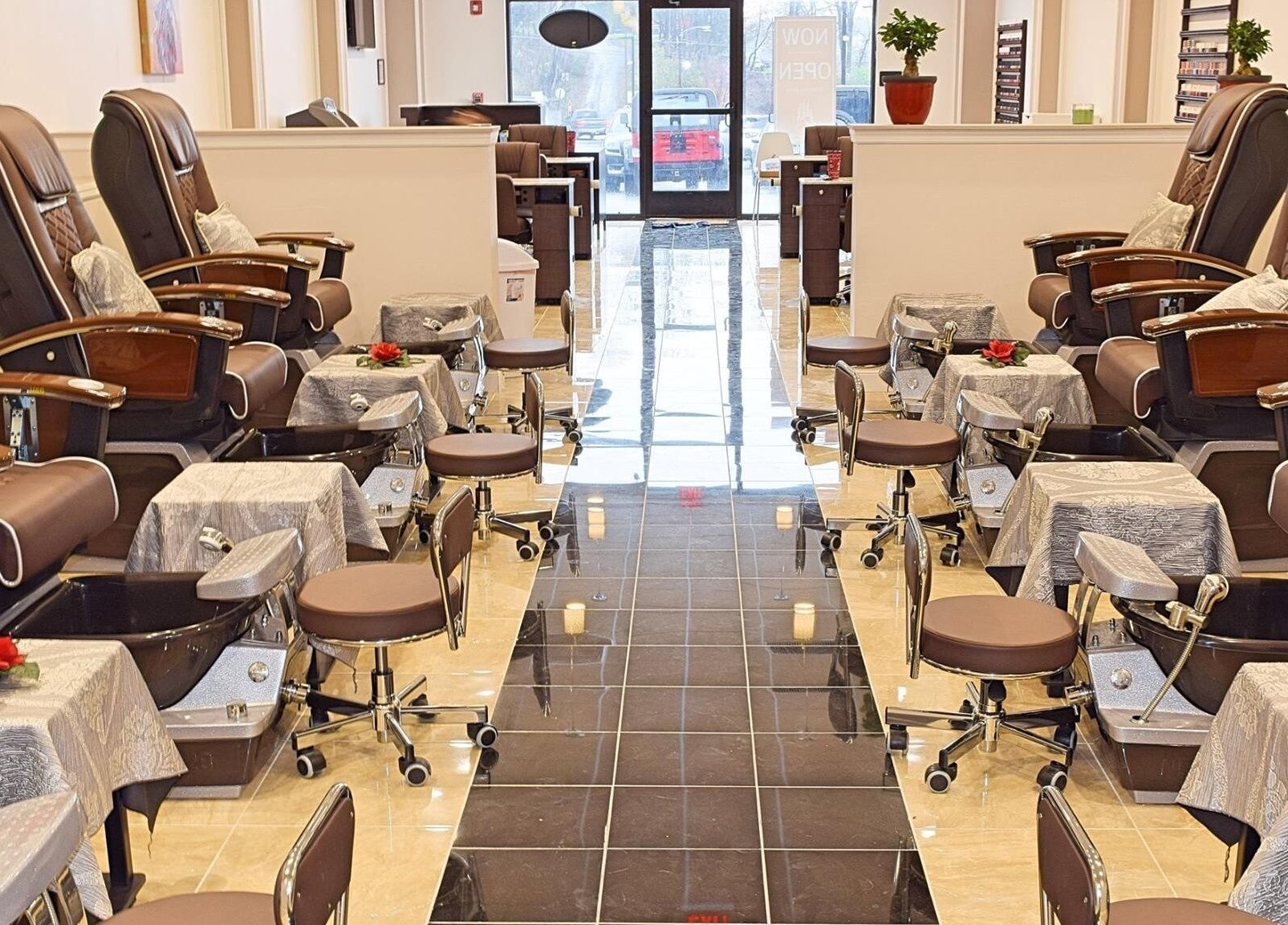 Luxurious pedicure chairs at Mani Nails & Spa in Bethel Park, Pennsylvania, US, offering a serene atmosphere.