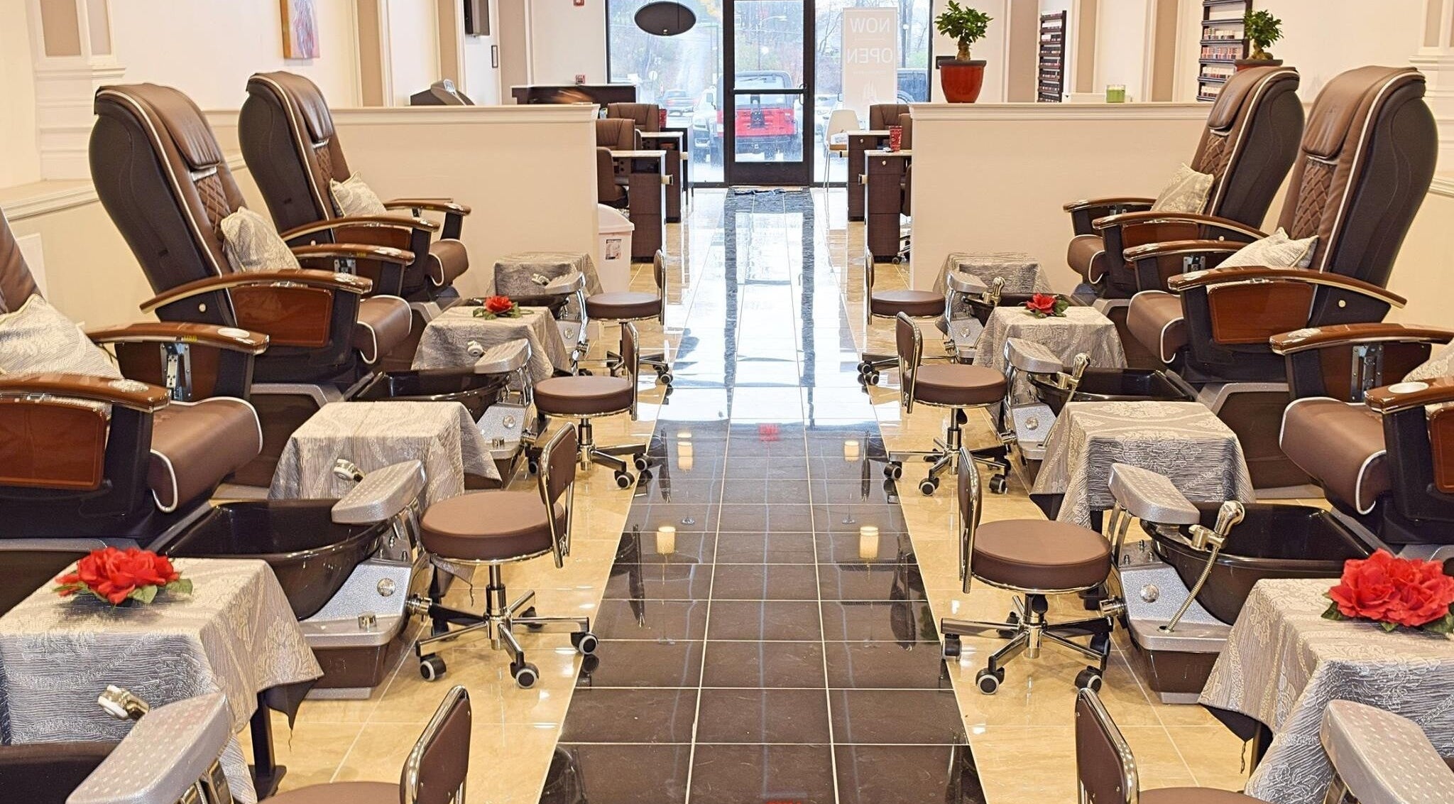 Luxurious pedicure chairs at Mani Nails & Spa in Bethel Park, Pennsylvania, US, offering a serene atmosphere.