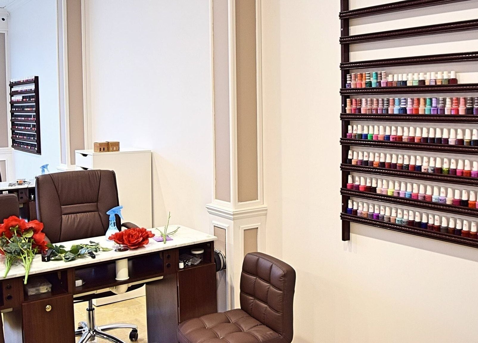 Elegant nail polish display and workspace at Mani Nails & Spa in Bethel Park, Pennsylvania, US.