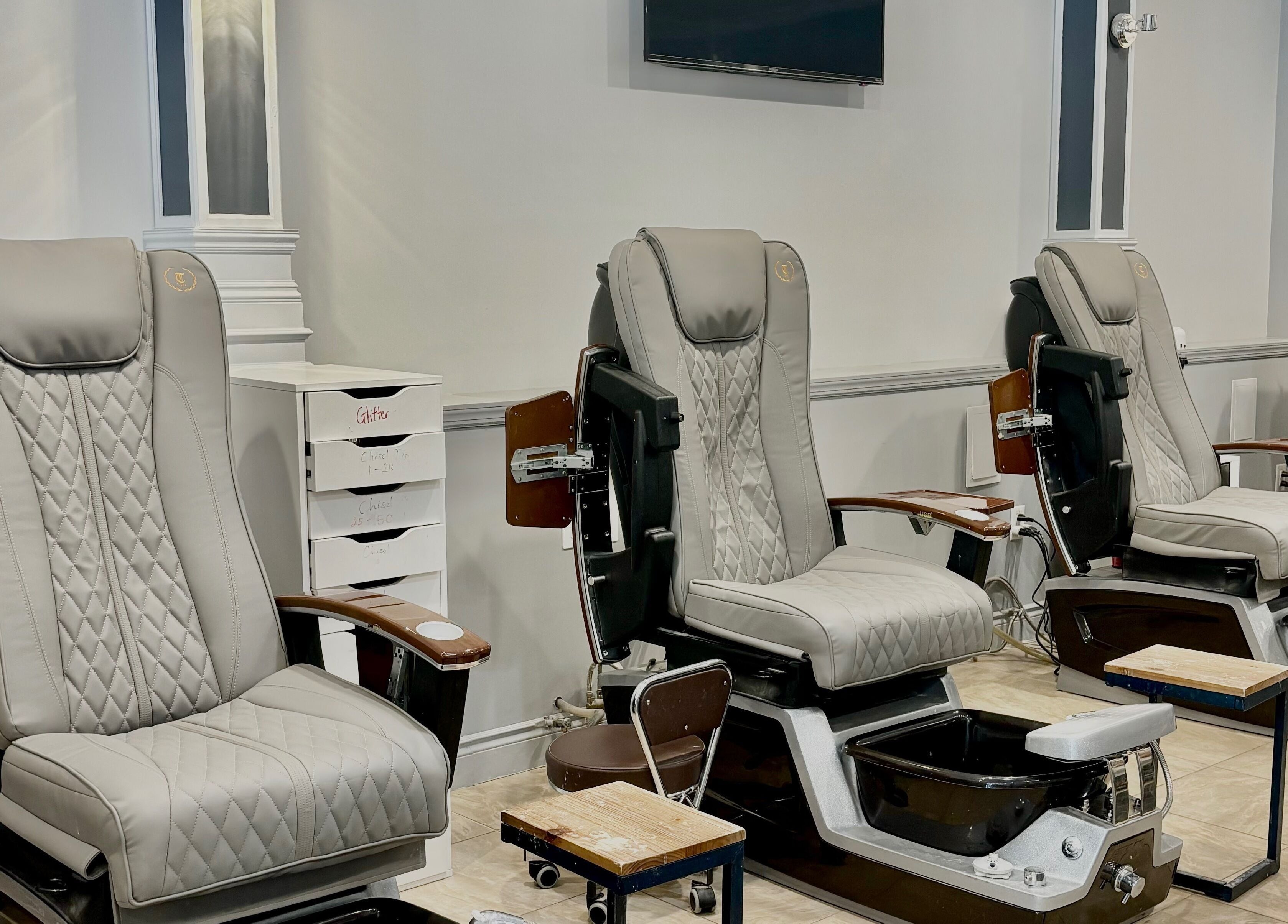 Luxurious pedicure chairs at Mani Nails & Spa in Bethel Park, Pennsylvania, US inviting relaxation and comfort.
