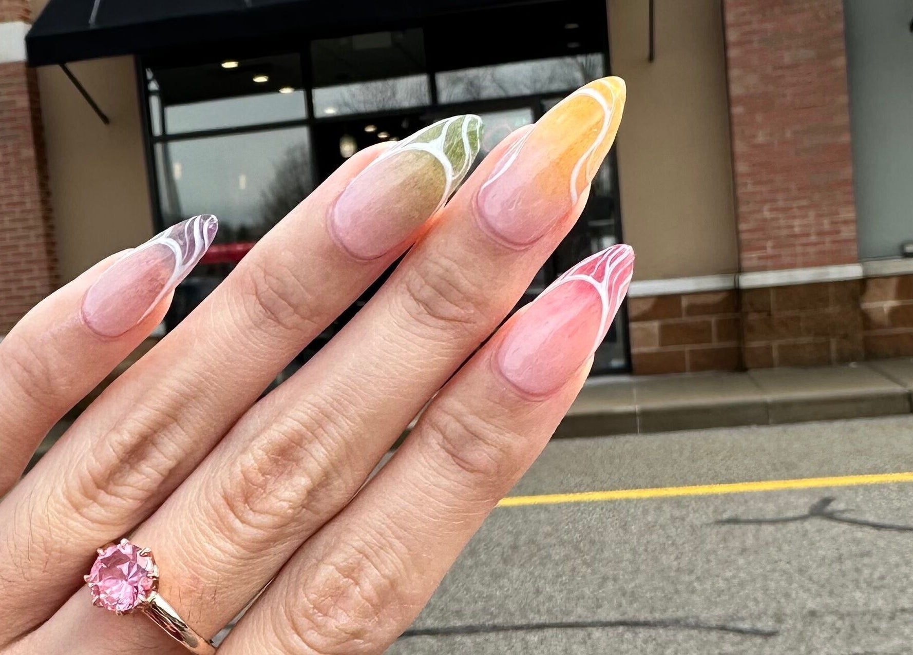 Colorful nail design at Mani Nails & Spa in Bethel Park, Pennsylvania, US.