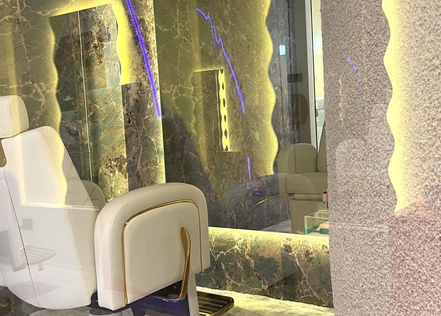 Elegant beauty lounge at Paddle B Face Gym in Kuala Lumpur with plush seating and ambient lighting.