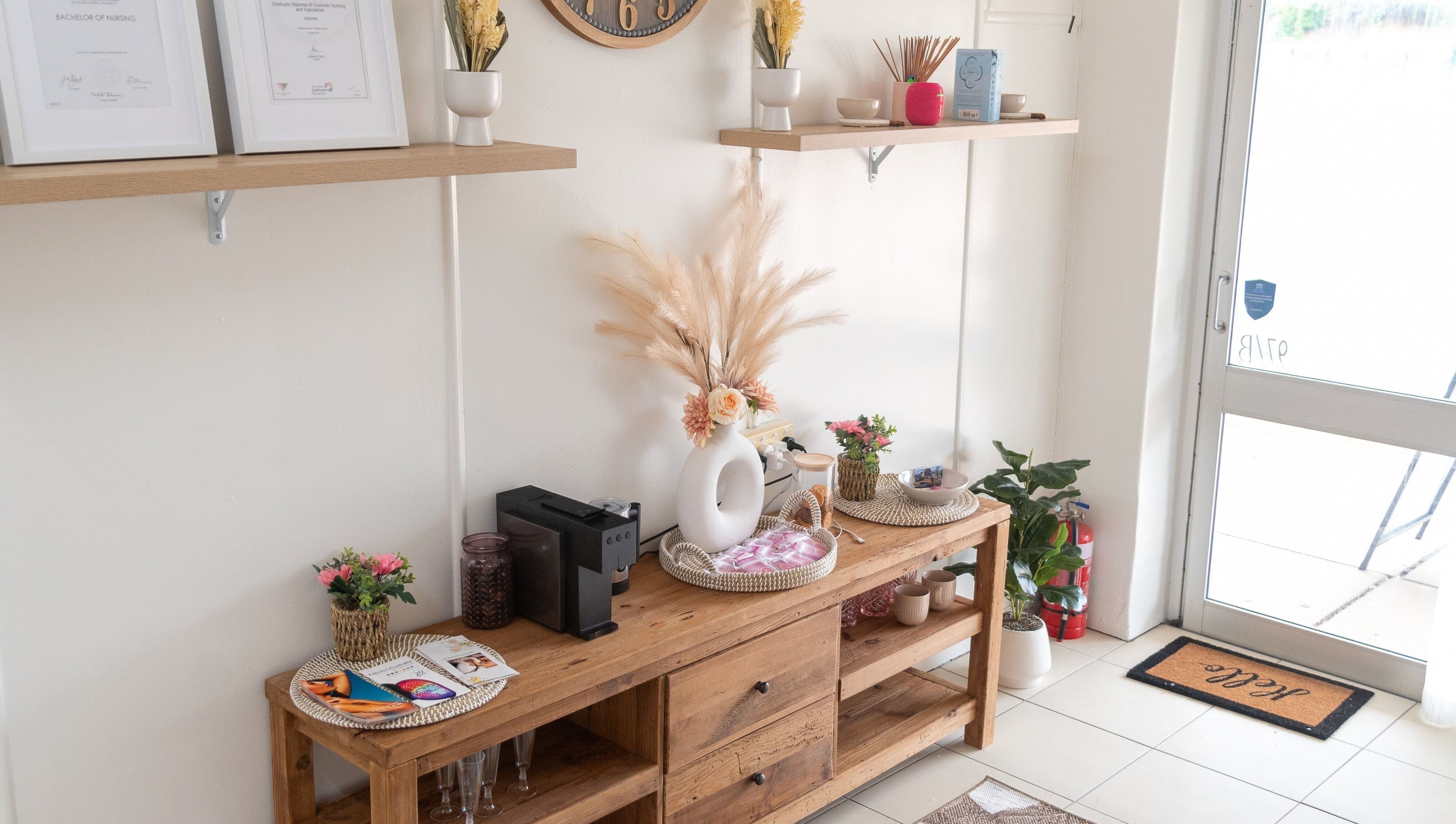 Entrance of Refresh and Reveal Cosmetic Skin Clinic- Chinchilla, featuring wood decor in Chinchilla, Queensland, AU.