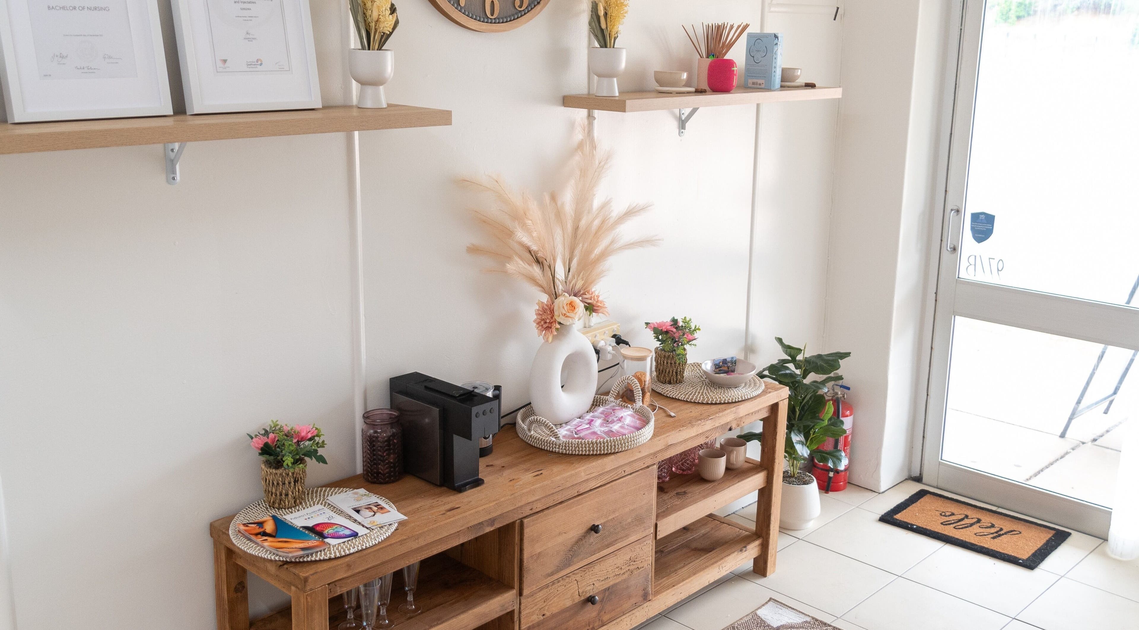 Entrance of Refresh and Reveal Cosmetic Skin Clinic- Chinchilla, featuring wood decor in Chinchilla, Queensland, AU.